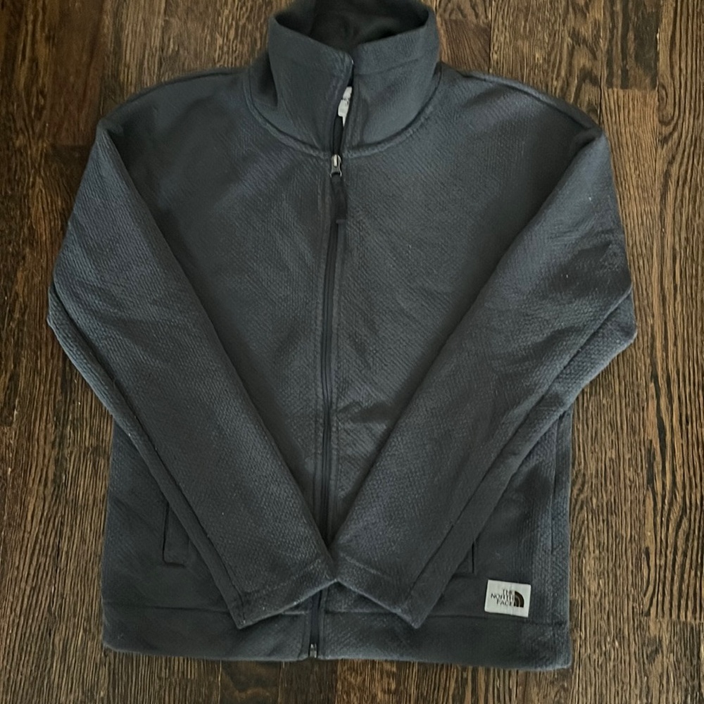 North Face Women’s zip up jacket.